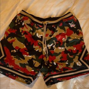 Jordan Black and Gold Mesh Shorts